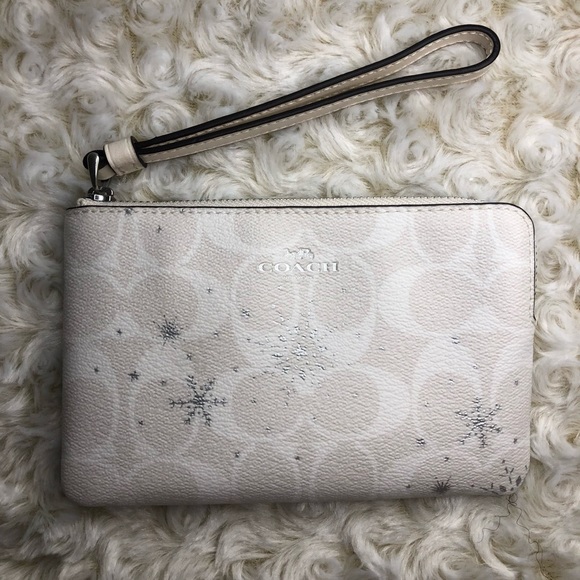 Coach Handbags - Coach holiday snowflake wristlet